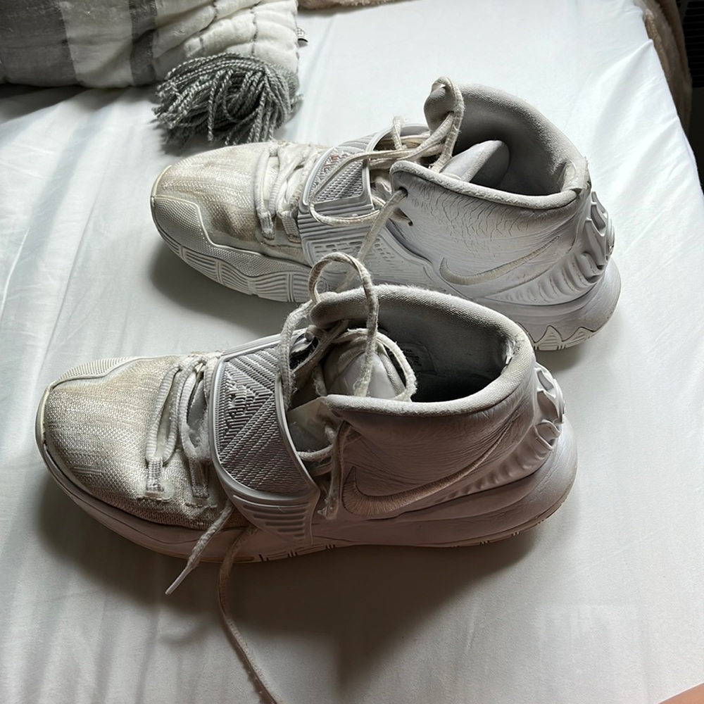White Nike Kyrie basketball shoes, used